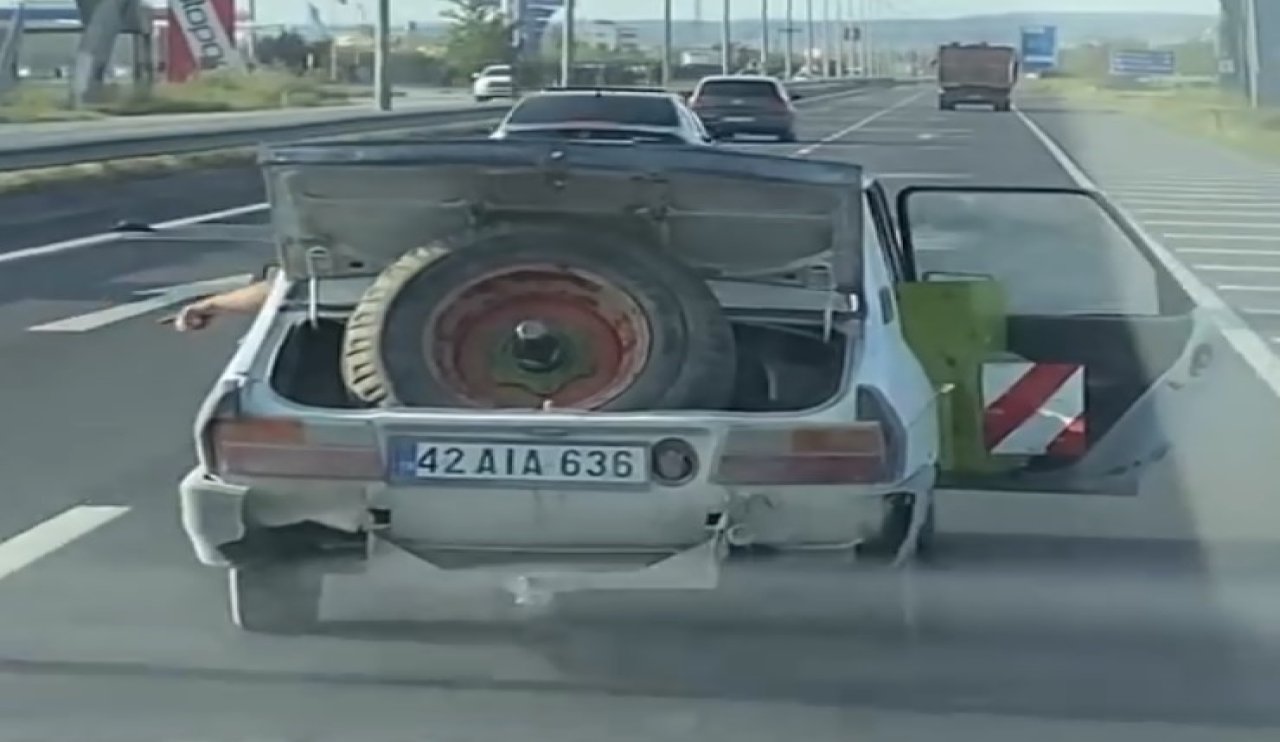 Aksaray'da bagaj ve kapısı açık seyreden sürücünün ehliyetine el konuldu