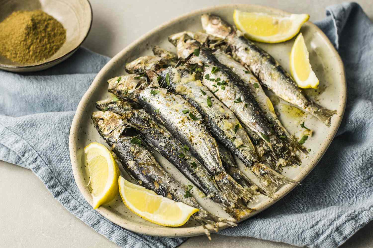 moroccan-baked-whole-sardines-recipe-2394638-hero-01-5c7da67146e0fb0001d83dc2-001.jpg